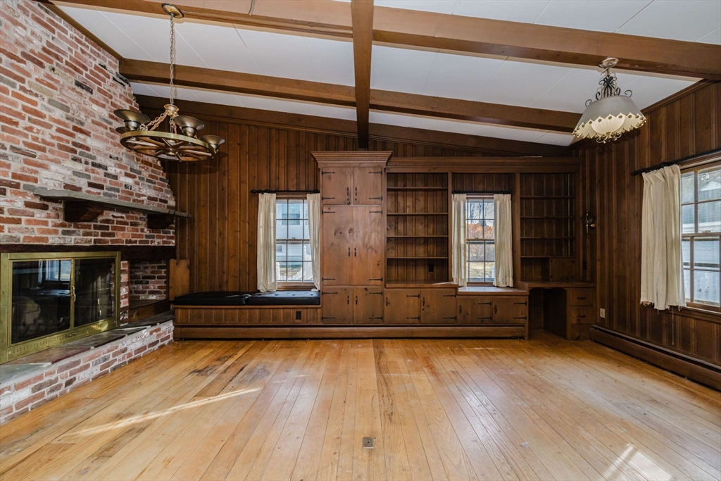 277 Valentine Street Fall River, MA 02720 - Photo 8 of 34 an empty room with wooden floor and windows