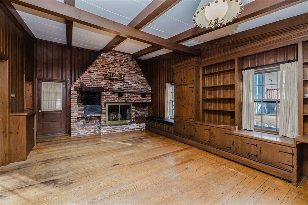 277 Valentine Street Fall River, MA 02720 - Photo 9 of 34 a view of a room with wooden floor and windows