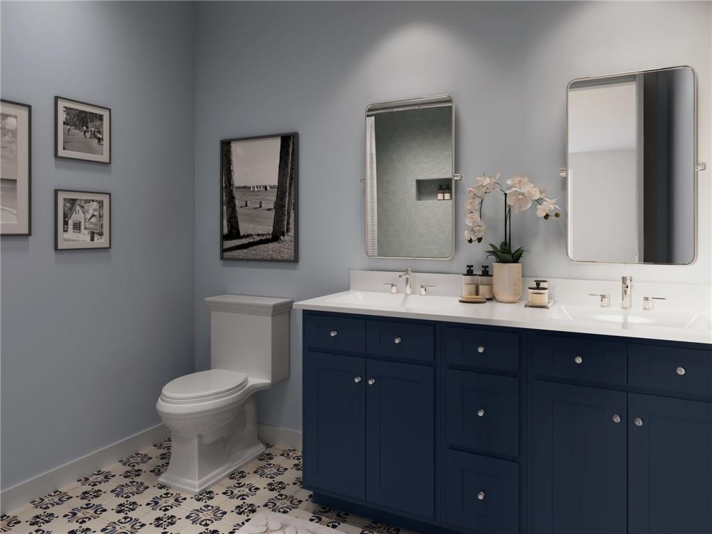 902 Reeb Way Cranberry Township, PA 16066 - Photo 18 of 31 a bathroom with a toilet sink and mirror