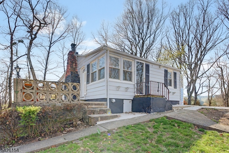 10 Berton Road Boonton, NJ 07005 - Photo 14 of 20 a front view of a house with garden