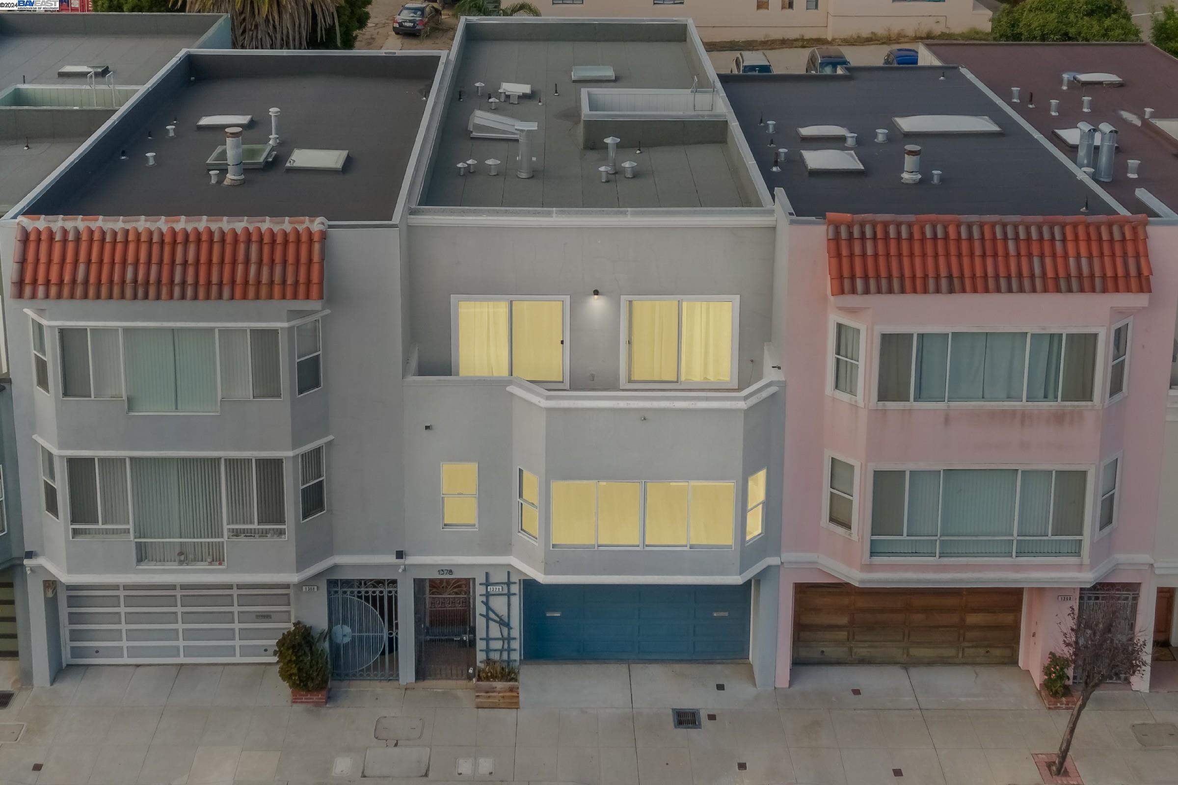 an aerial view of a house with a balcony