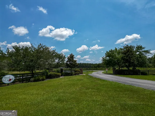 a view of a golf course with a fountain