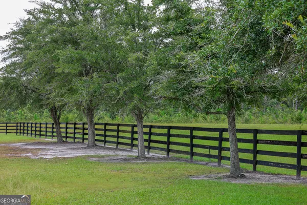 a view of a bench in a park