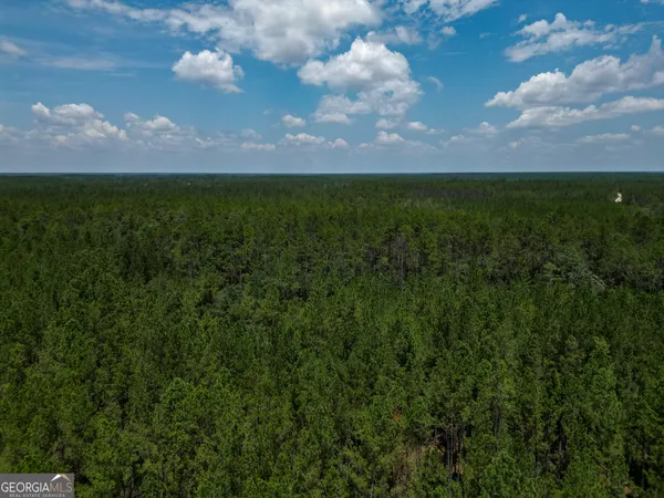 a view of a golf course with a lake