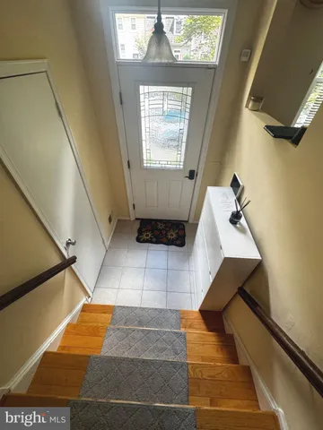 a bathroom with a mirror and a shower