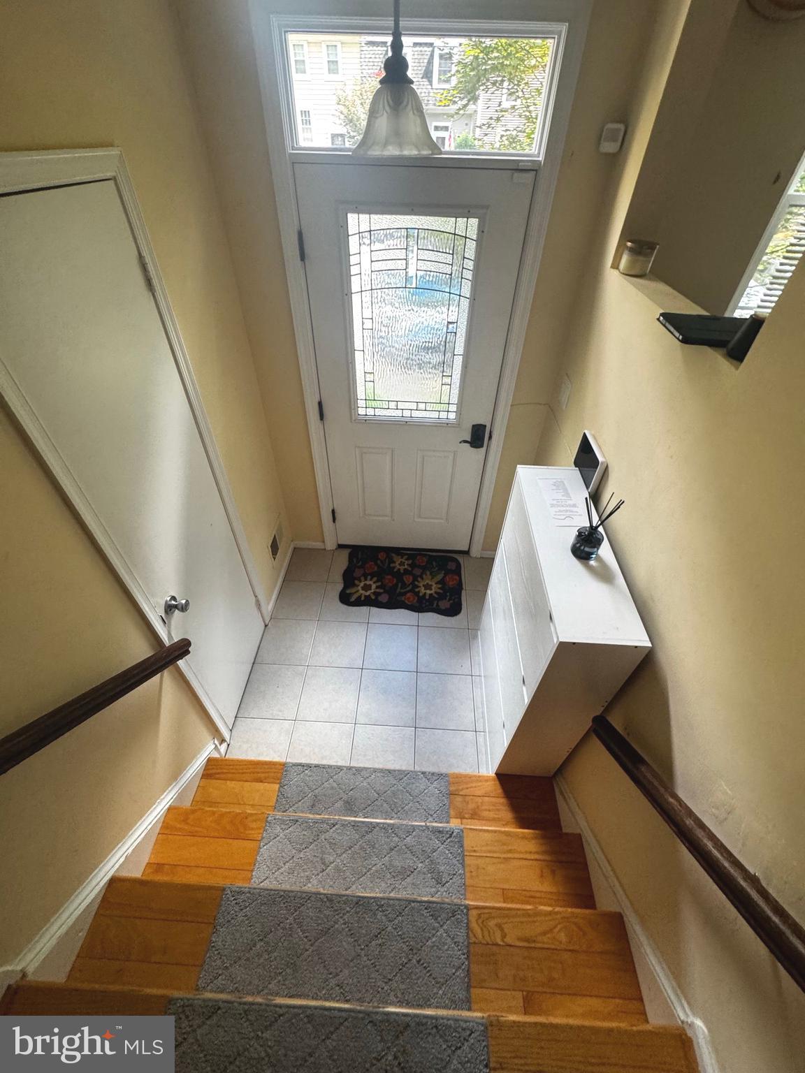 5718 Wood Mouse Court Burke, VA 22015 - Photo 2 of 23 a bathroom with a mirror and a shower