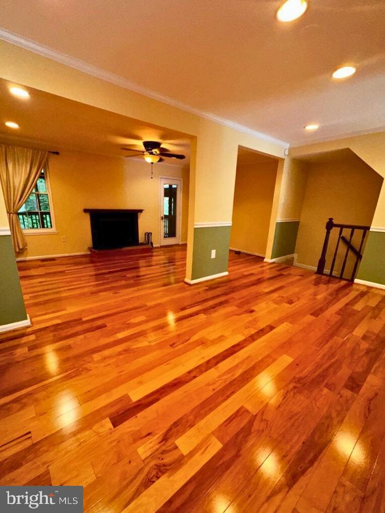 5718 Wood Mouse Court Burke, VA 22015 - Photo 5 of 23 a view of a room with wooden floor