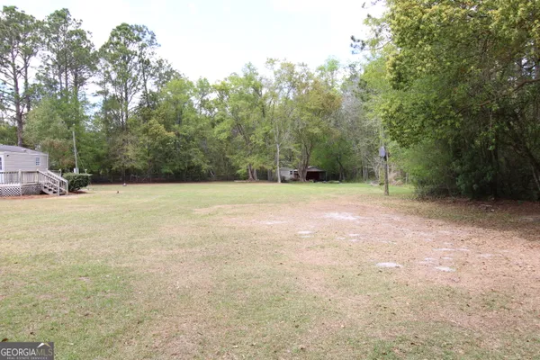 a view of an outdoor space with trees
