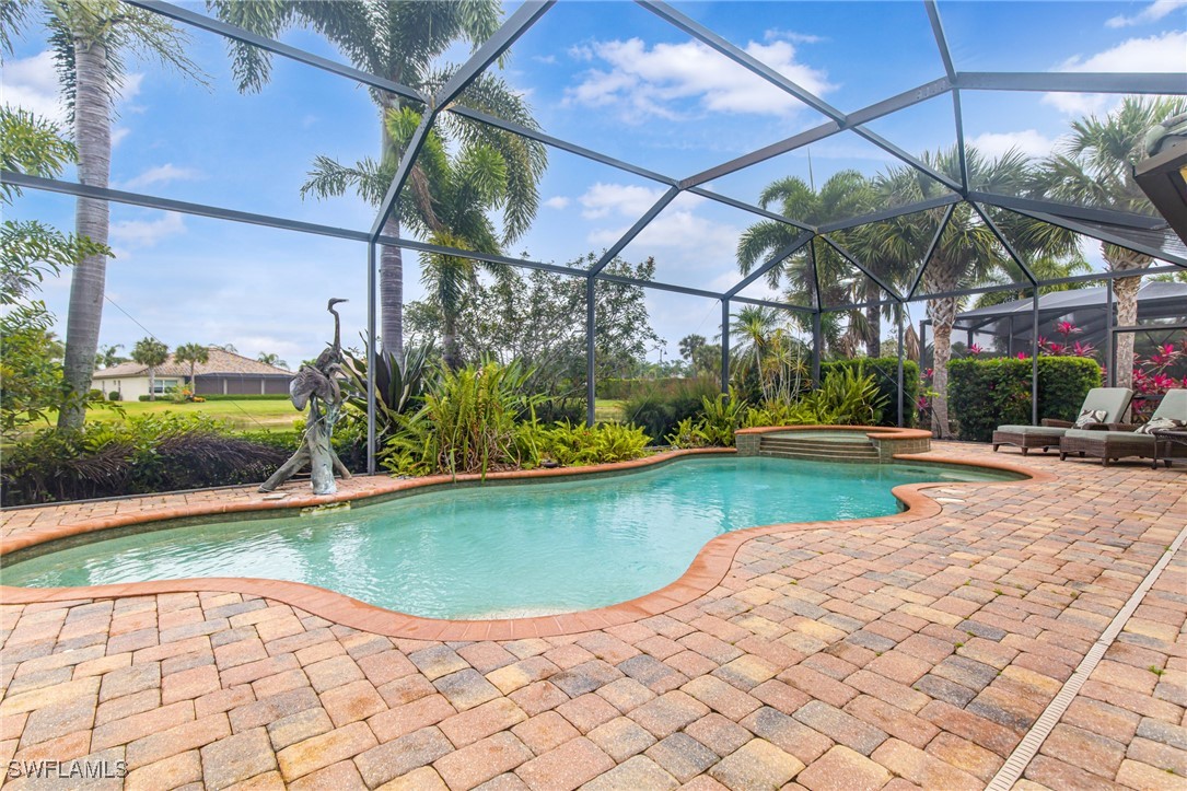 11208 Lithgow Lane Fort Myers, FL 33913 - Photo 42 of 49 a view of a swimming pool with a patio