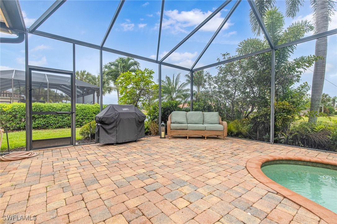 11208 Lithgow Lane Fort Myers, FL 33913 - Photo 46 of 49 a view of a backyard with plants and outdoor seating