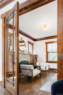 a bedroom with furniture and a window