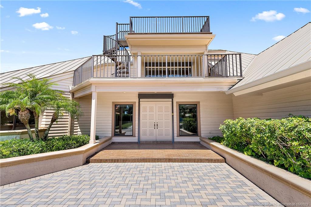 19 Island Road Sewall's Point, FL 34996 - Photo 12 of 50 a view of a building with potted plants