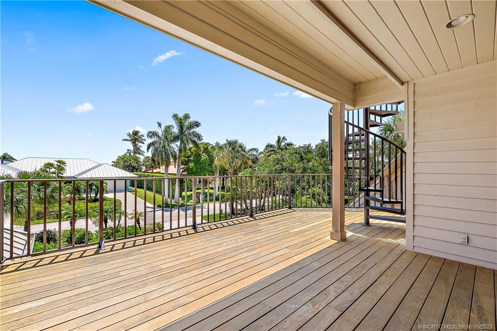 19 Island Road Sewall's Point, FL 34996 - Photo 43 of 50 a view of a balcony with wooden floor