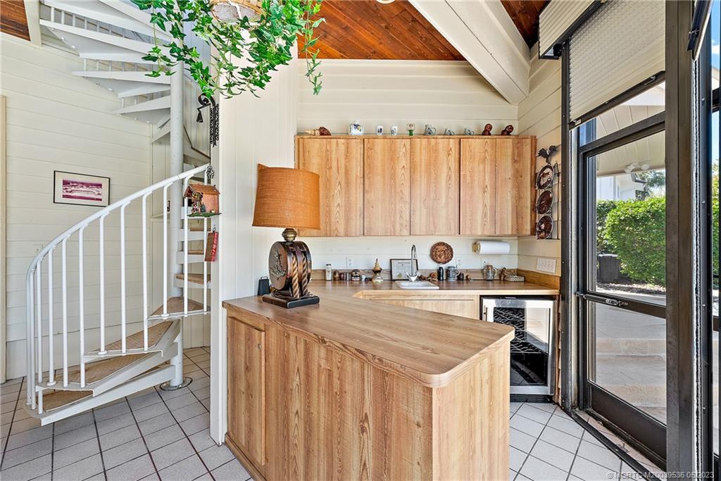 19 Island Road Sewall's Point, FL 34996 - Photo 48 of 50 a kitchen with a stove and a refrigerator