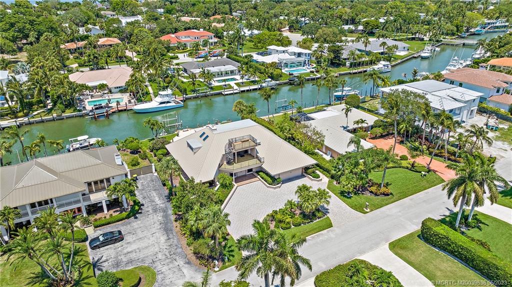 19 Island Road Sewall's Point, FL 34996 - Photo 5 of 50 an aerial view of a house with a lake view