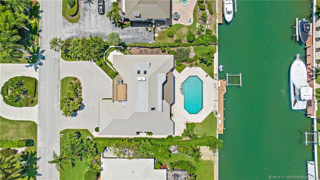 19 Island Road Sewall's Point, FL 34996 - Photo 7 of 50 an aerial view of a house with a swimming pool
