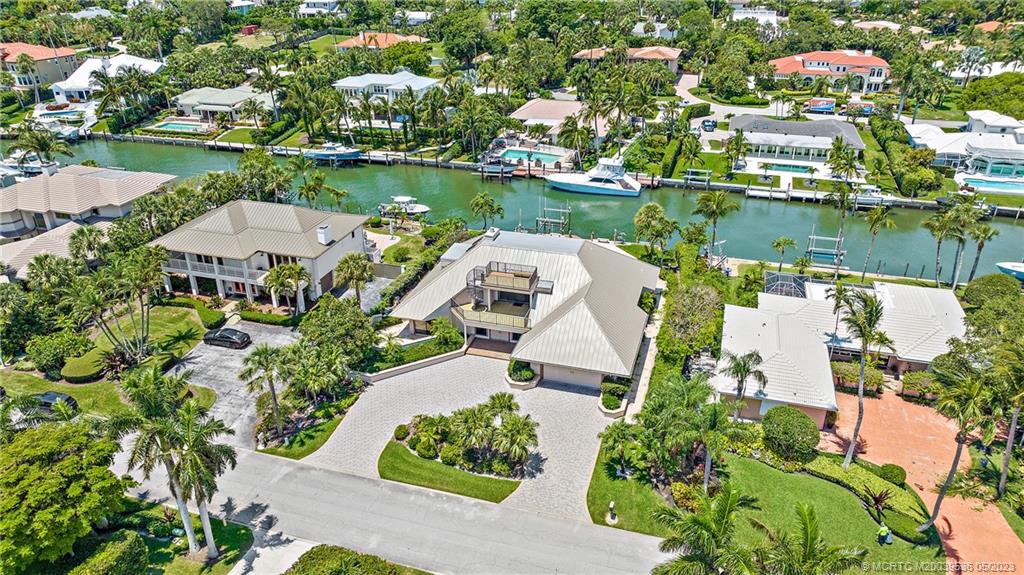 19 Island Road Sewall's Point, FL 34996 - Photo 8 of 50 an aerial view of a house with a lake view