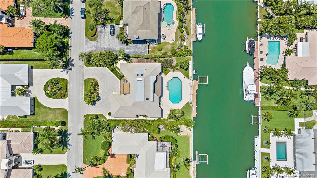 19 Island Road Sewall's Point, FL 34996 - Photo 9 of 50 an aerial view of multiple house with outdoor space and sign board