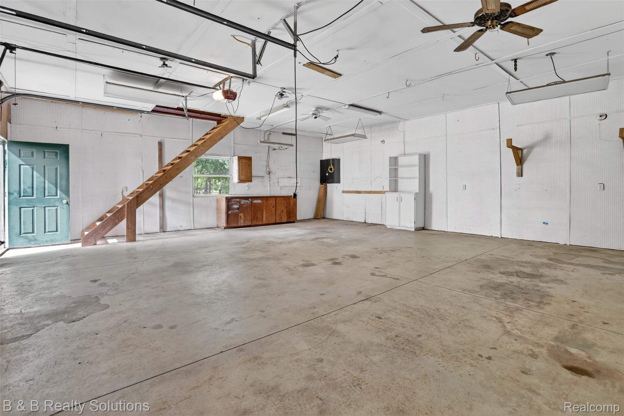 6100 Fish Lake Road North Branch, MI 48461 - Photo 40 of 45 Garage with a ceiling fan