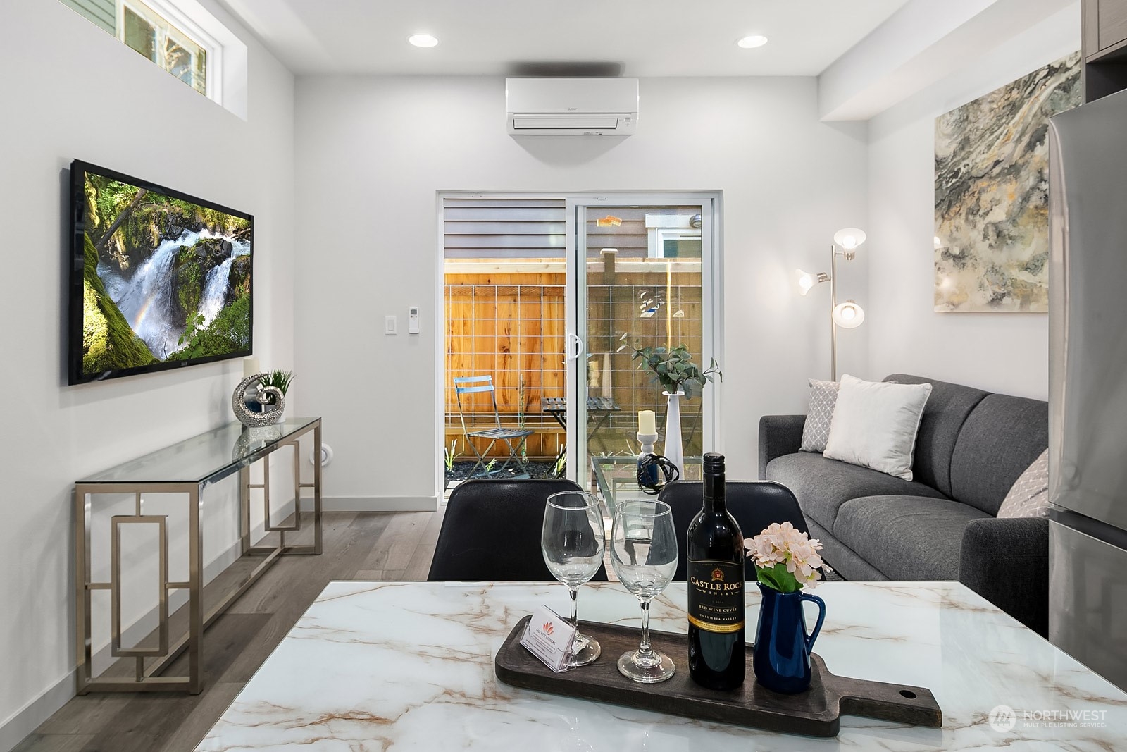 1123 D 18th Avenue Seattle, WA 98122 - Photo 12 of 22 a living room with furniture and a flat screen tv