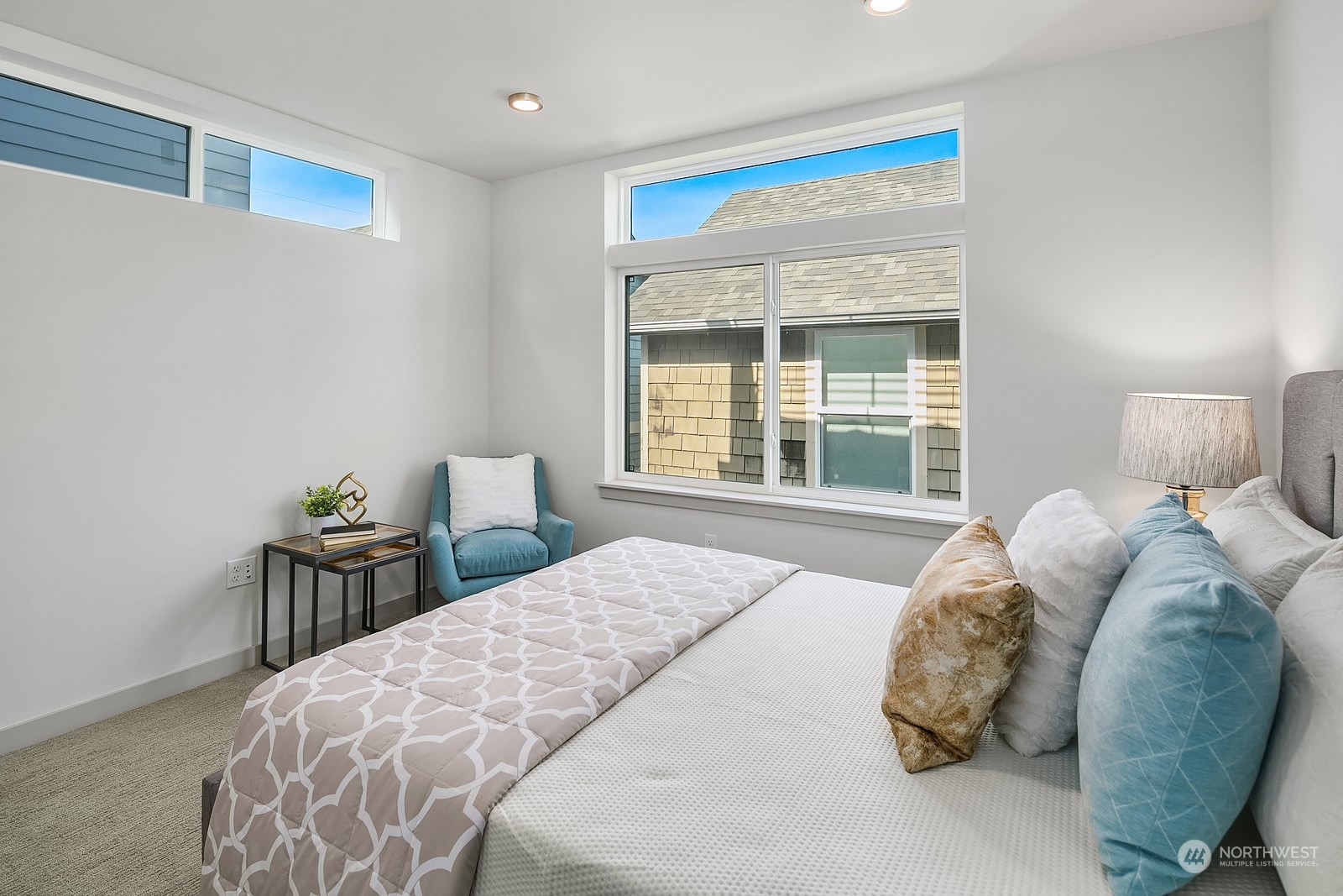 1123 D 18th Avenue Seattle, WA 98122 - Photo 15 of 22 a bedroom with a bed and window