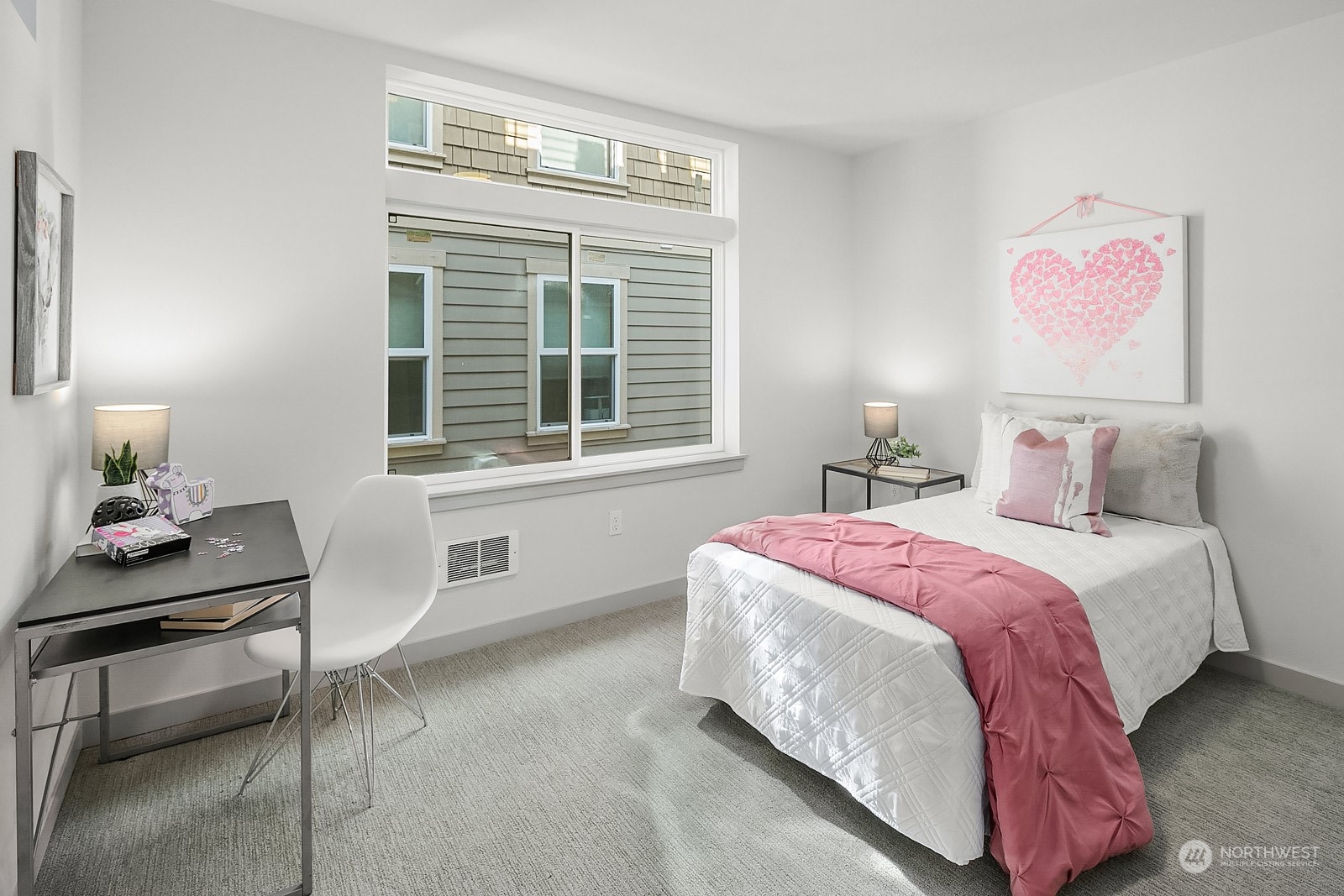 1123 D 18th Avenue Seattle, WA 98122 - Photo 17 of 22 a bedroom with a bed and a table