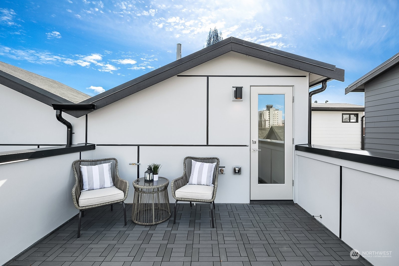 1123 D 18th Avenue Seattle, WA 98122 - Photo 20 of 22 a view of two chairs in the balcony