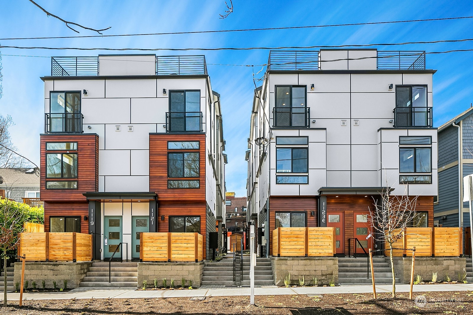 1123 D 18th Avenue Seattle, WA 98122 - Photo 2 of 22 a view of a brick house with large windows