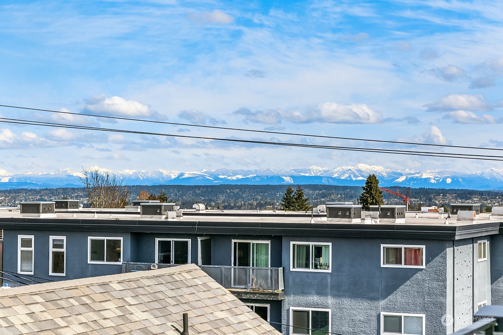 1123 D 18th Avenue Seattle, WA 98122 - Photo 22 of 22 a view of a building with a lot of windows