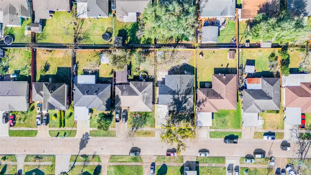 an aerial view of houses and roads