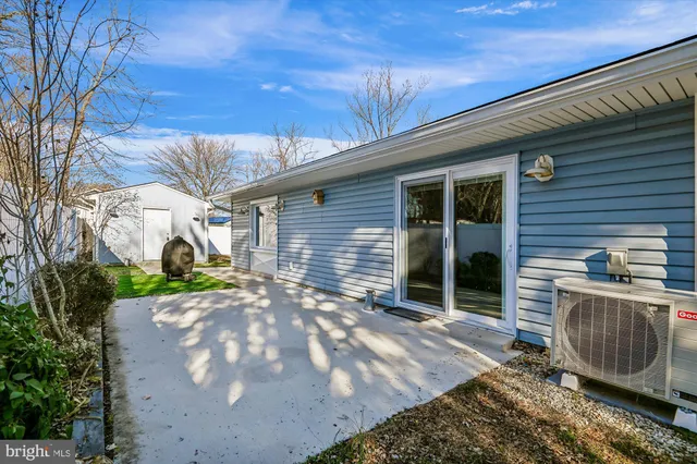 a view of a pathway with a yard