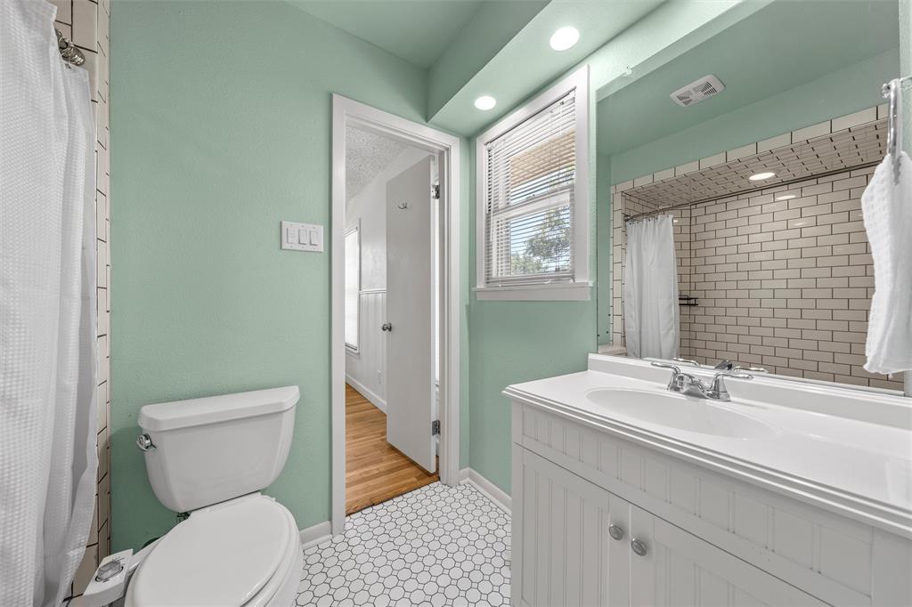 3924 North 30th Street Waco, TX 76708 - Photo 18 of 33 A "Jack n Jill" bath with large shower is shared by bedrooms 1 and 2 on left side of home.