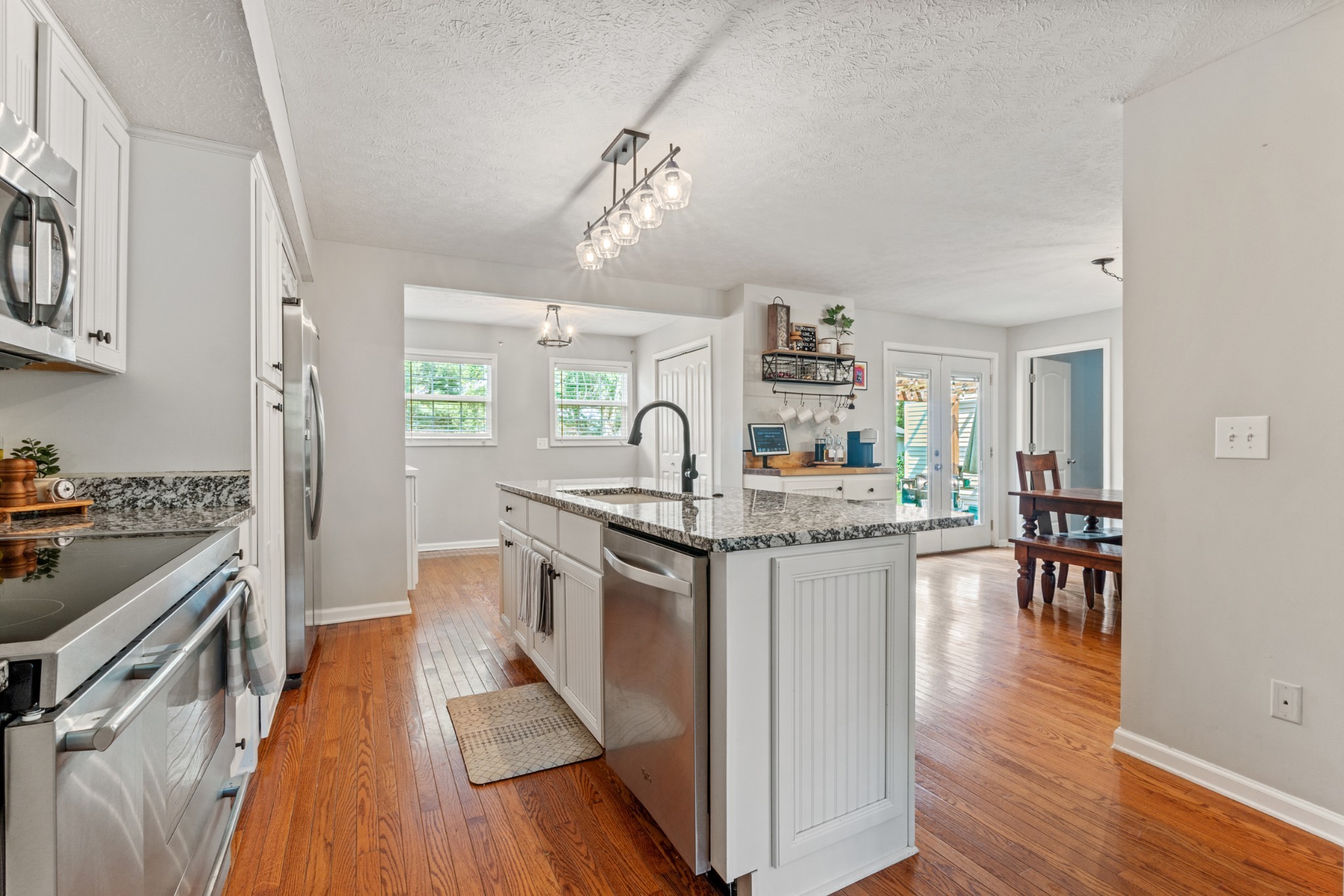 105 South Palmers Chapel Road White House, TN 37188 - Photo 12 of 42 UpdAted kitchen with granite countertops, island with bar seating and SSA.