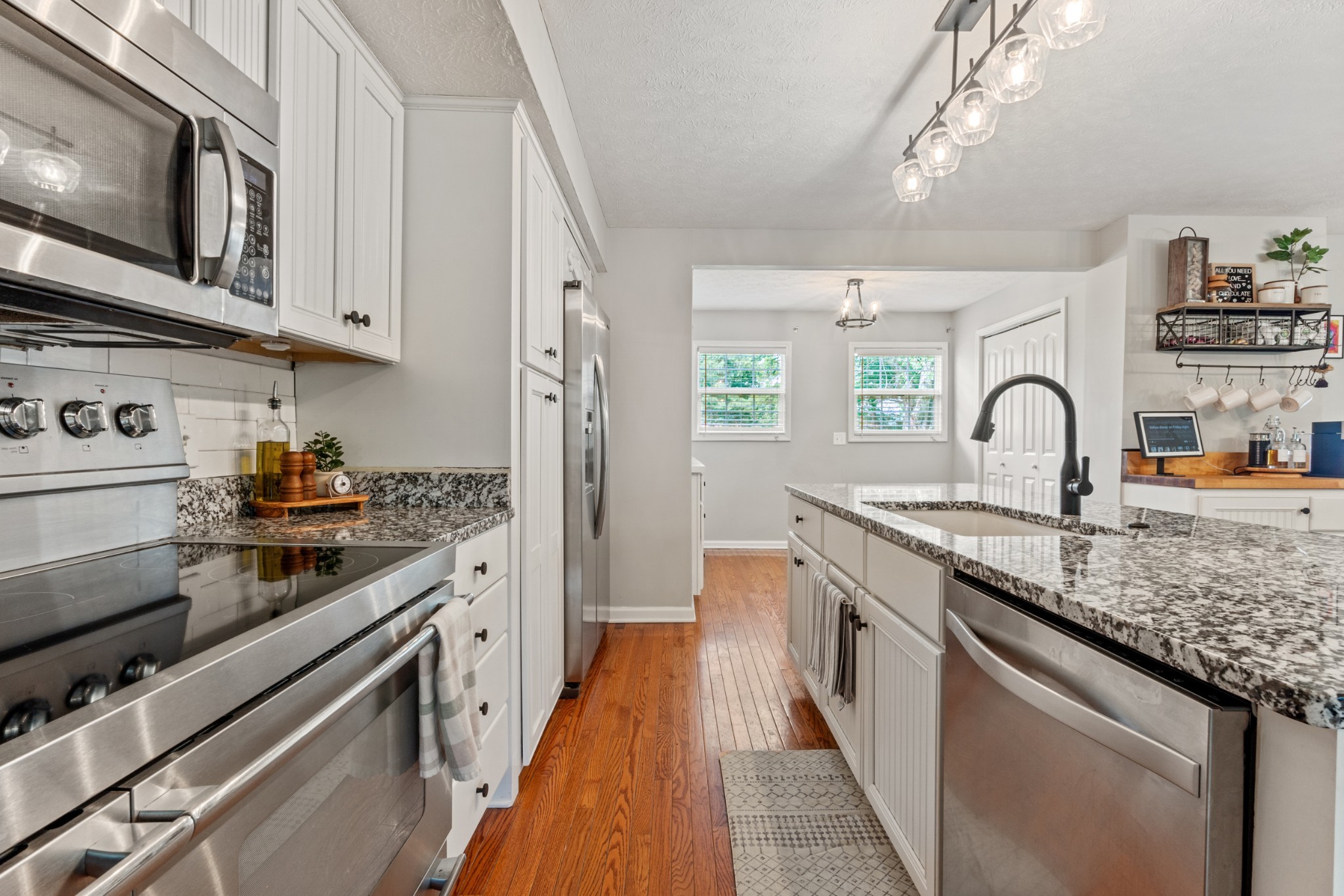 105 South Palmers Chapel Road White House, TN 37188 - Photo 13 of 42 Beautiful modern white cabinets in kitchen.