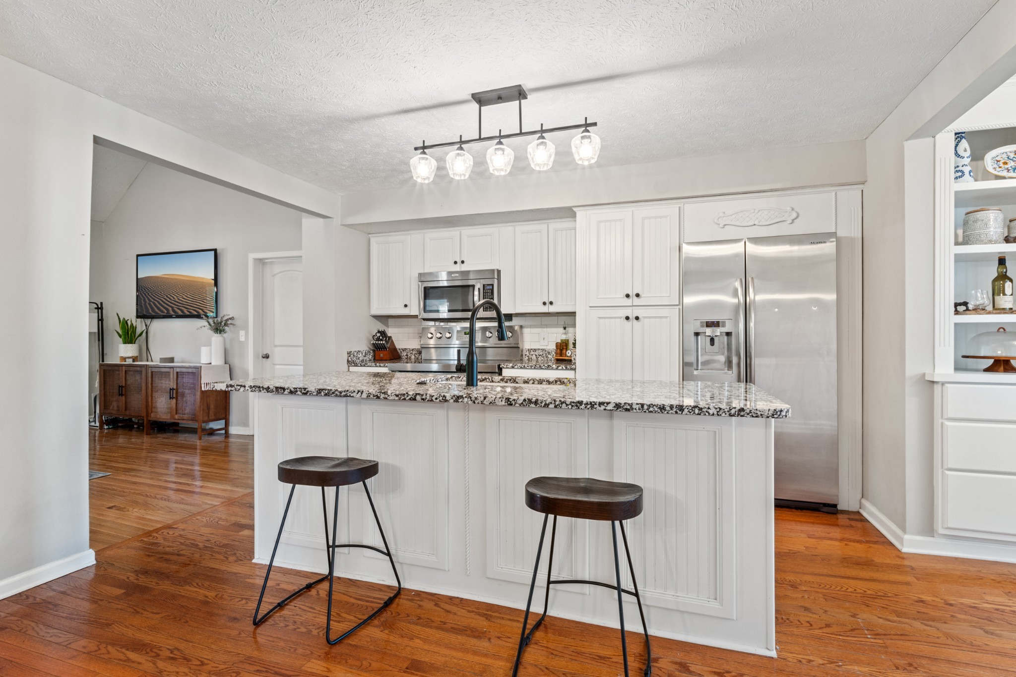 105 South Palmers Chapel Road White House, TN 37188 - Photo 14 of 42 updated kitchen with Granite countertops, Bar setting at island.