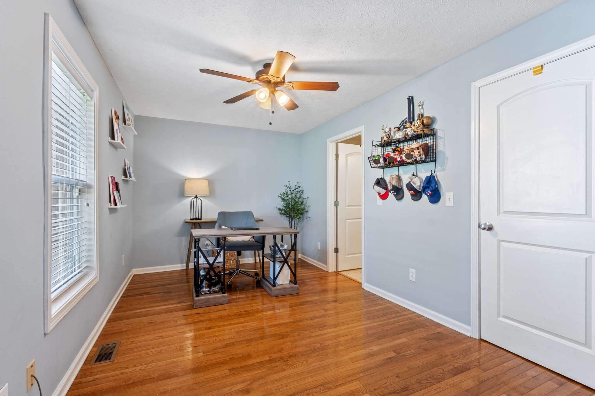 105 South Palmers Chapel Road White House, TN 37188 - Photo 21 of 42 Bedroom one being utilized as an offer, connected to bedroom two with jack and Jill bathroom. Offers Spacious closet and hardwood floors