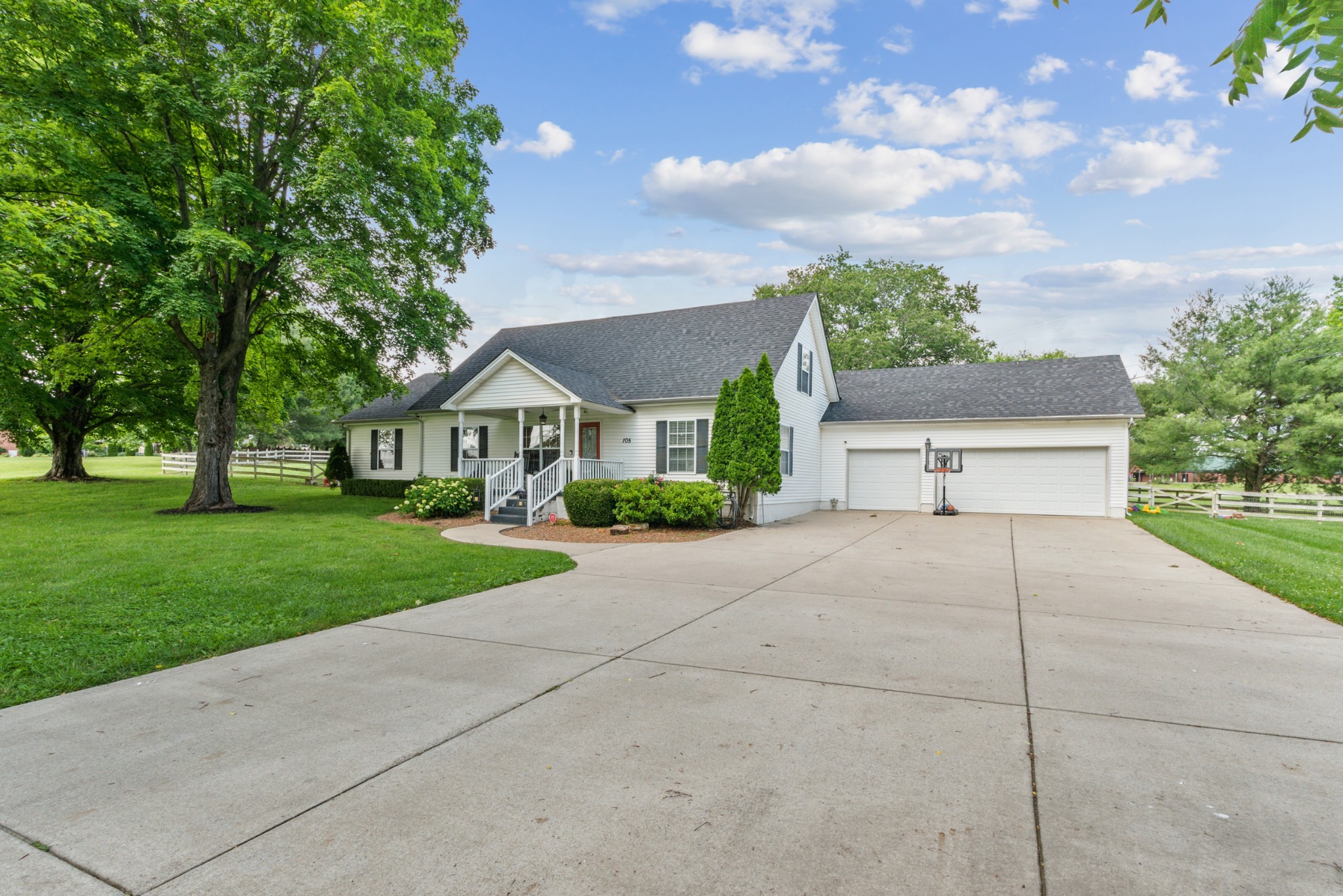 105 South Palmers Chapel Road White House, TN 37188 - Photo 3 of 42 Beautiful home on almost a full acres with a THREE car garage and loads of additional parking.