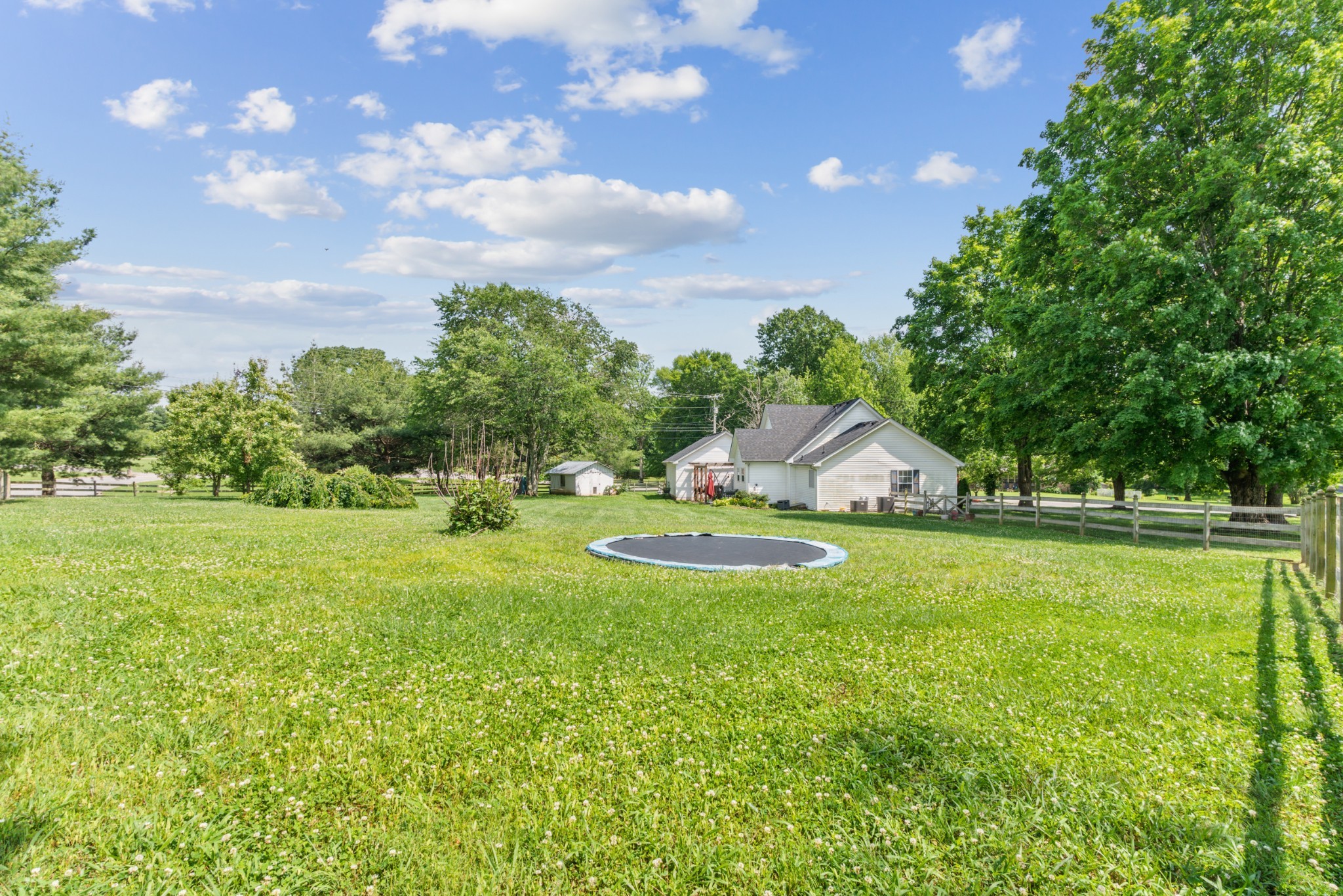 105 South Palmers Chapel Road White House, TN 37188 - Photo 35 of 42 The stunning fenced in backyard offers an in ground trampoline, fire pit, pergola covered patio and fruit trees. PLUS a hop skip walk to HB Williams Elementary School