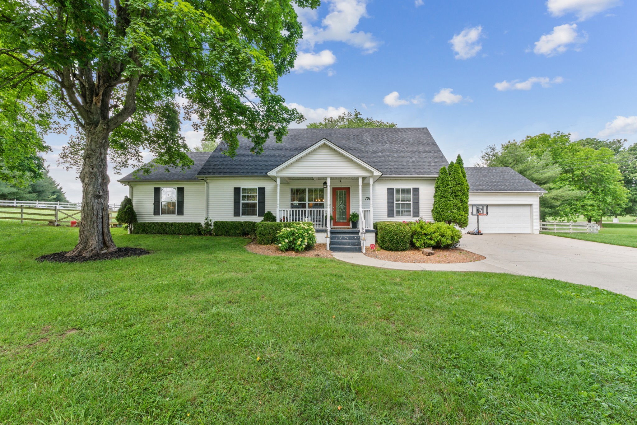 105 South Palmers Chapel Road White House, TN 37188 - Photo 4 of 42 Cozy home nestled on almost an almost acre, level lot.