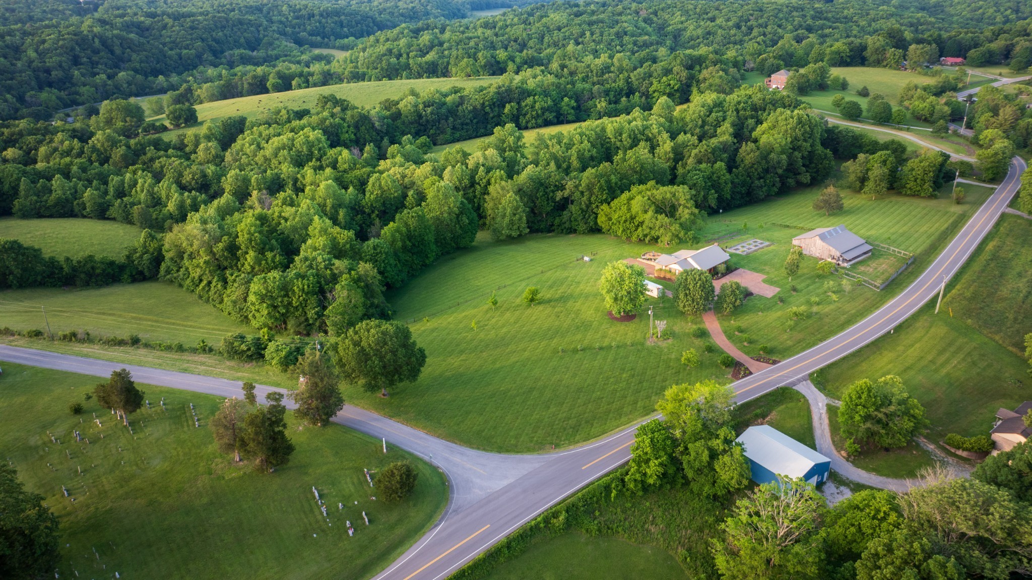 5956 Greenbriar Road Franklin, TN 37064 - Photo 35 of 41 an aerial view of a residential houses with outdoor space and street view