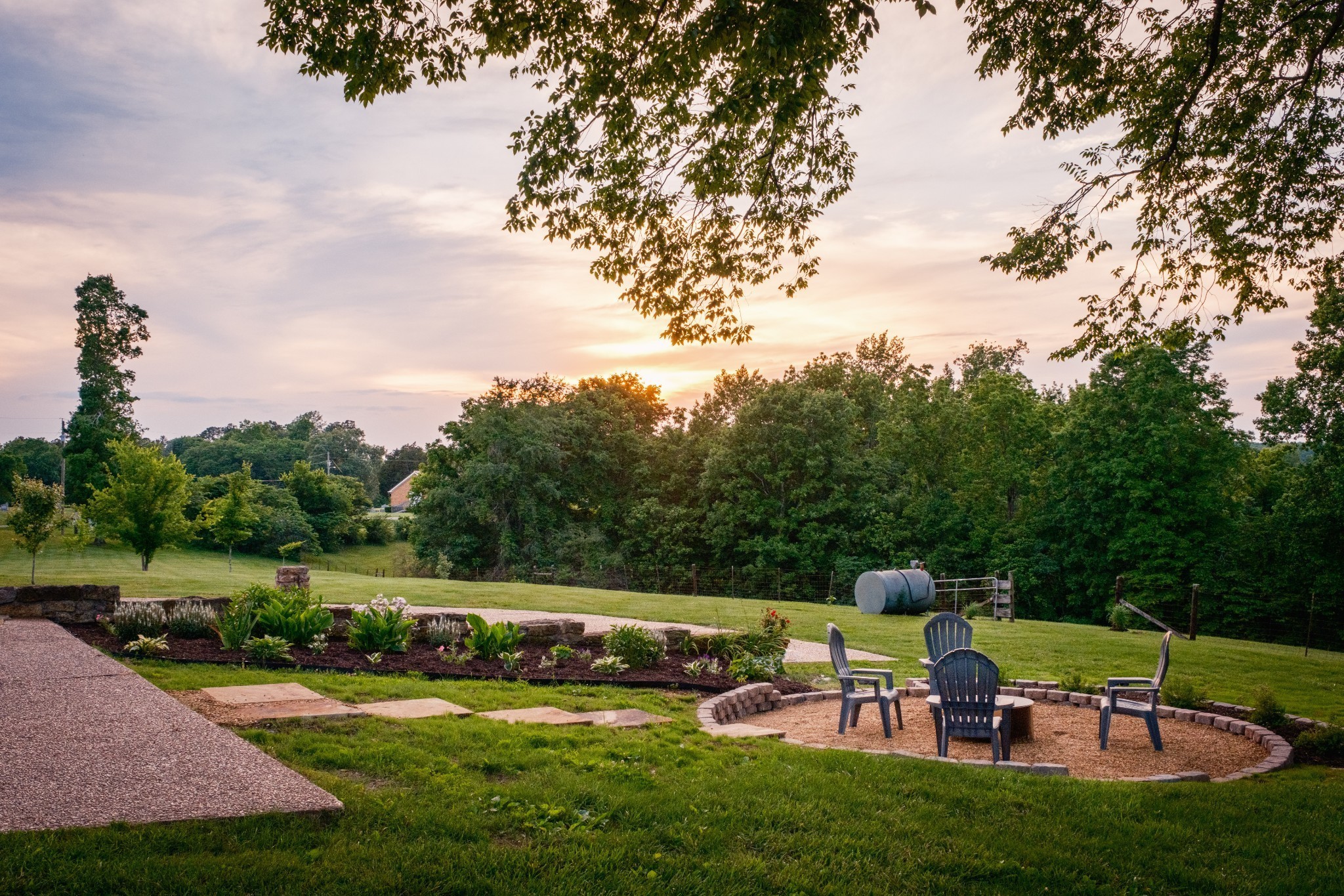 5956 Greenbriar Road Franklin, TN 37064 - Photo 6 of 41 a view of an chairs and table on the garden