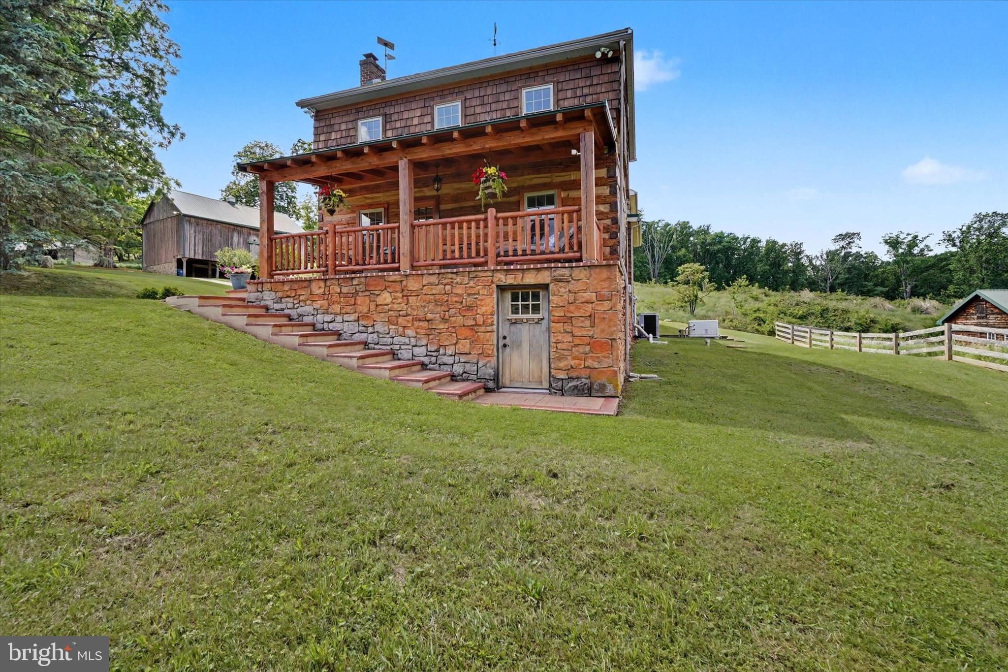 4941 Walters Hatchery Road Spring Grove, PA 17362 - Photo 12 of 71 front view of a house with a yard