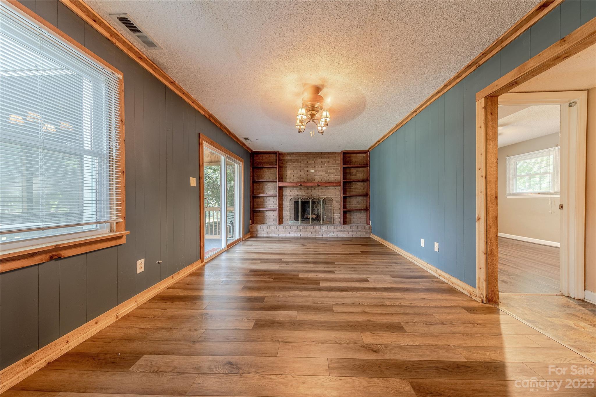 1702 Carson Street Monroe, NC 28110 - Photo 11 of 29 a view of a livingroom with a staircase
