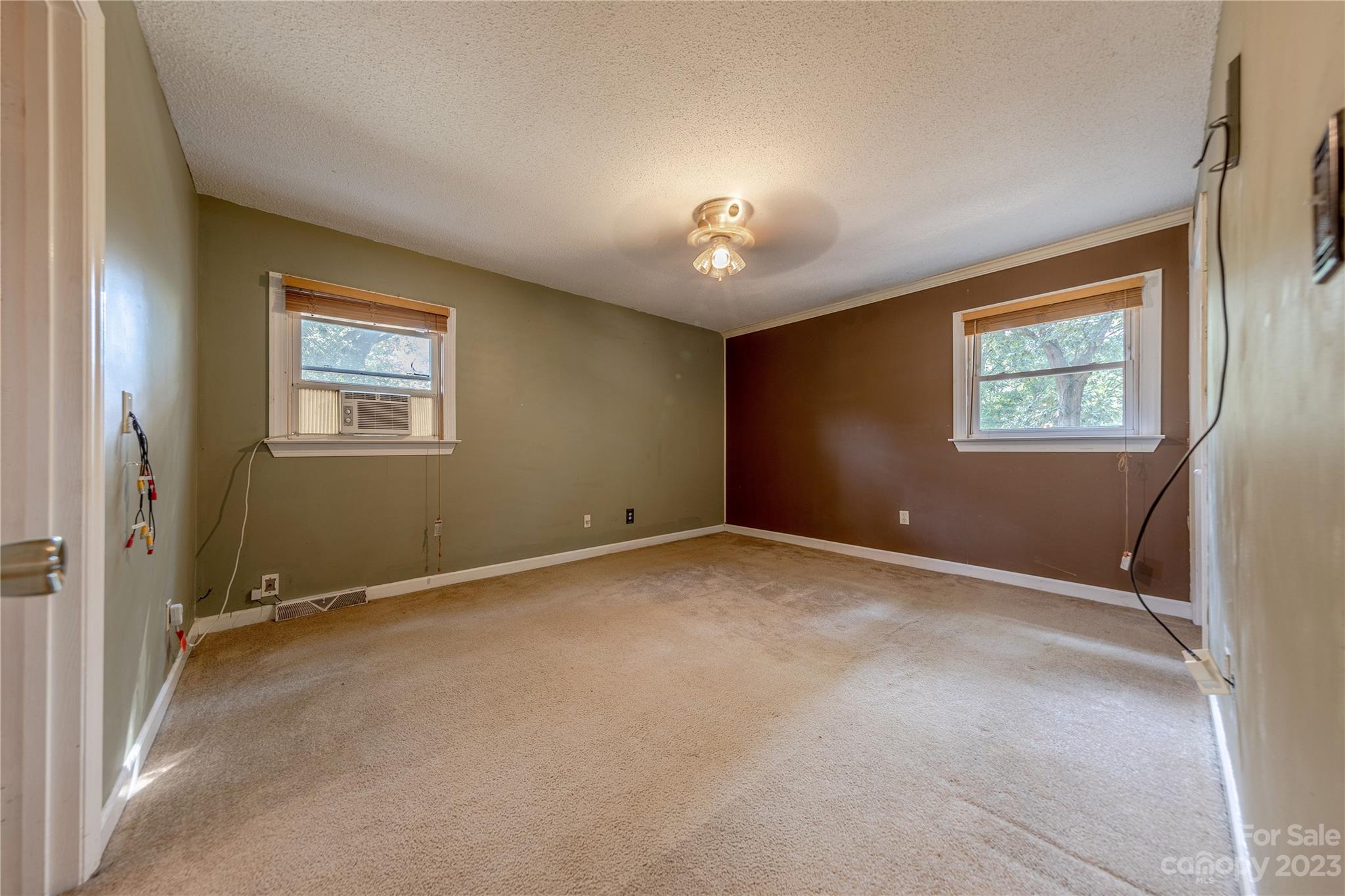 1702 Carson Street Monroe, NC 28110 - Photo 12 of 29 a view of an empty room with a window