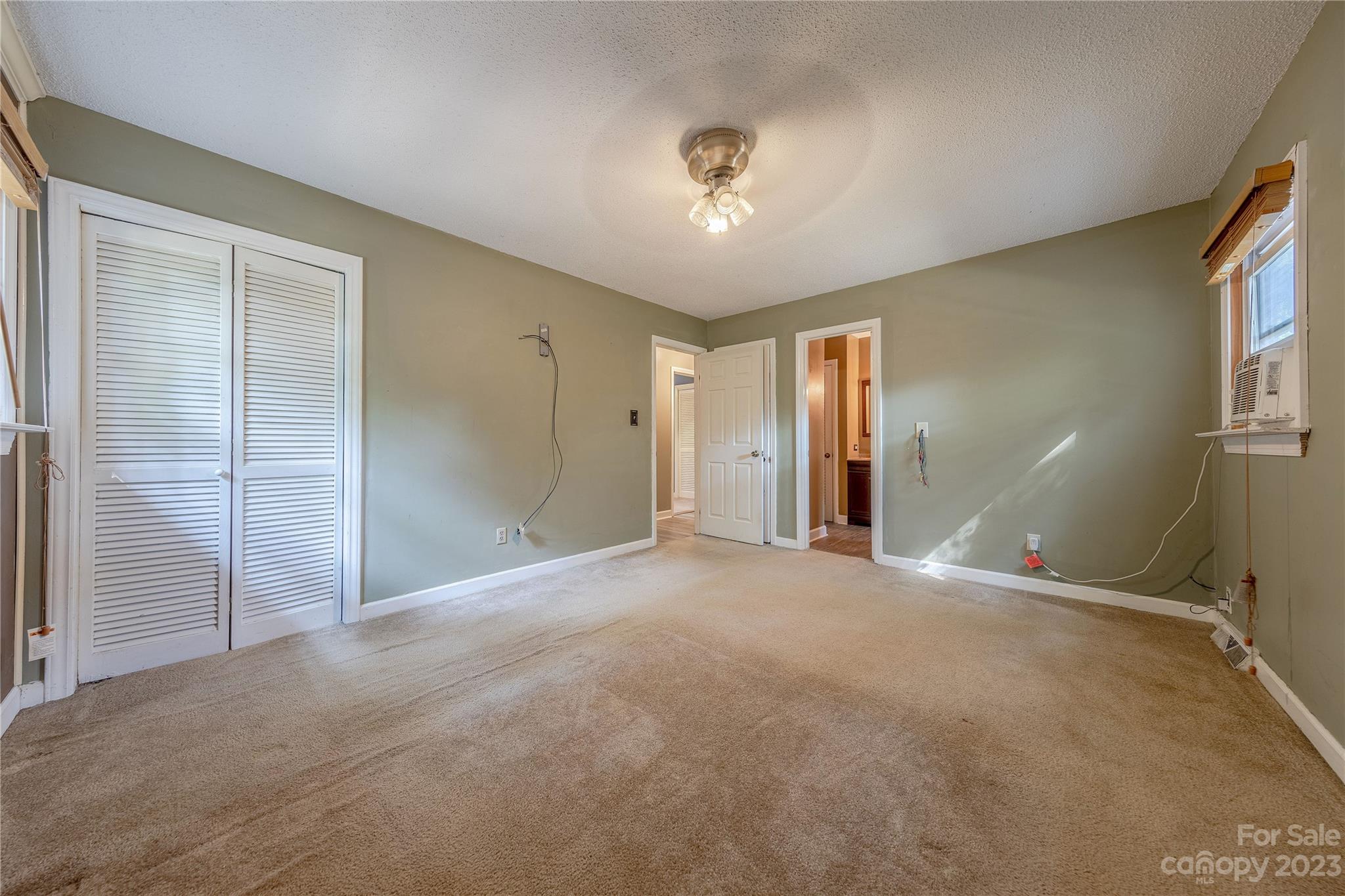 1702 Carson Street Monroe, NC 28110 - Photo 13 of 29 a view of an empty room with a window