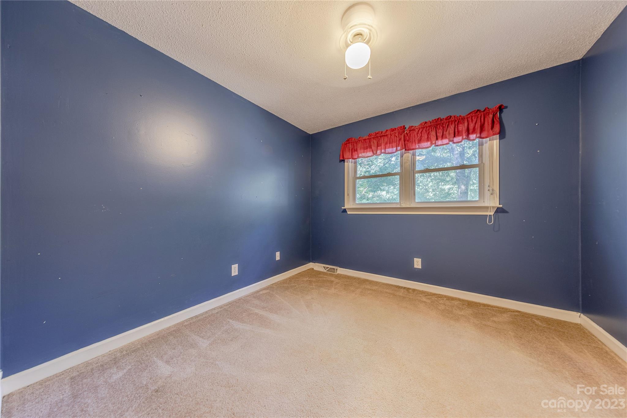 1702 Carson Street Monroe, NC 28110 - Photo 14 of 29 an empty room with windows