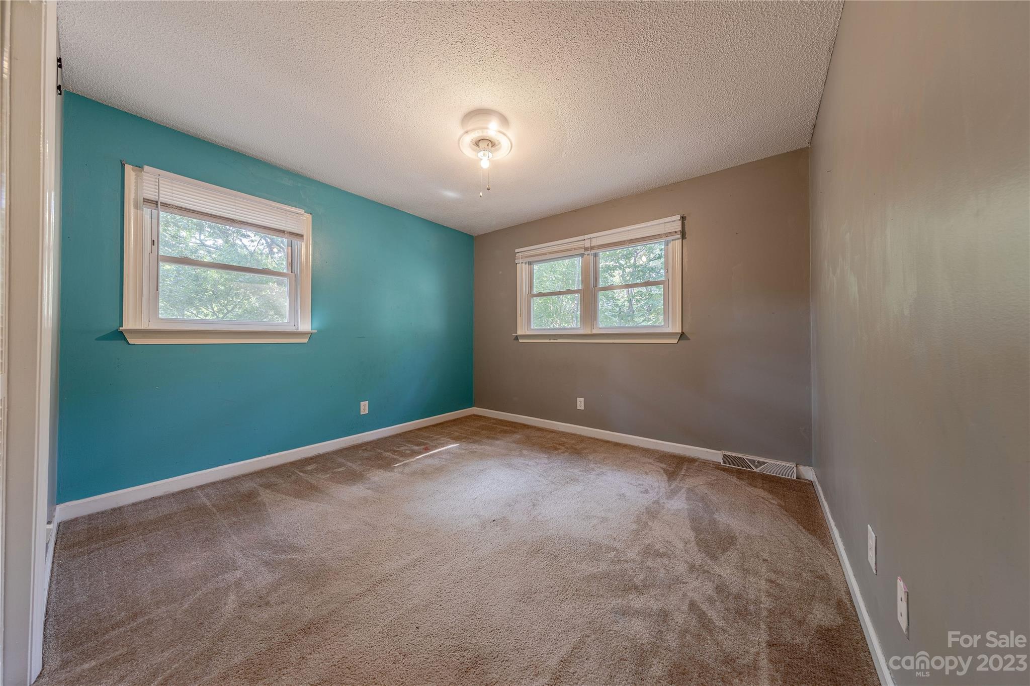 1702 Carson Street Monroe, NC 28110 - Photo 16 of 29 an empty room with windows