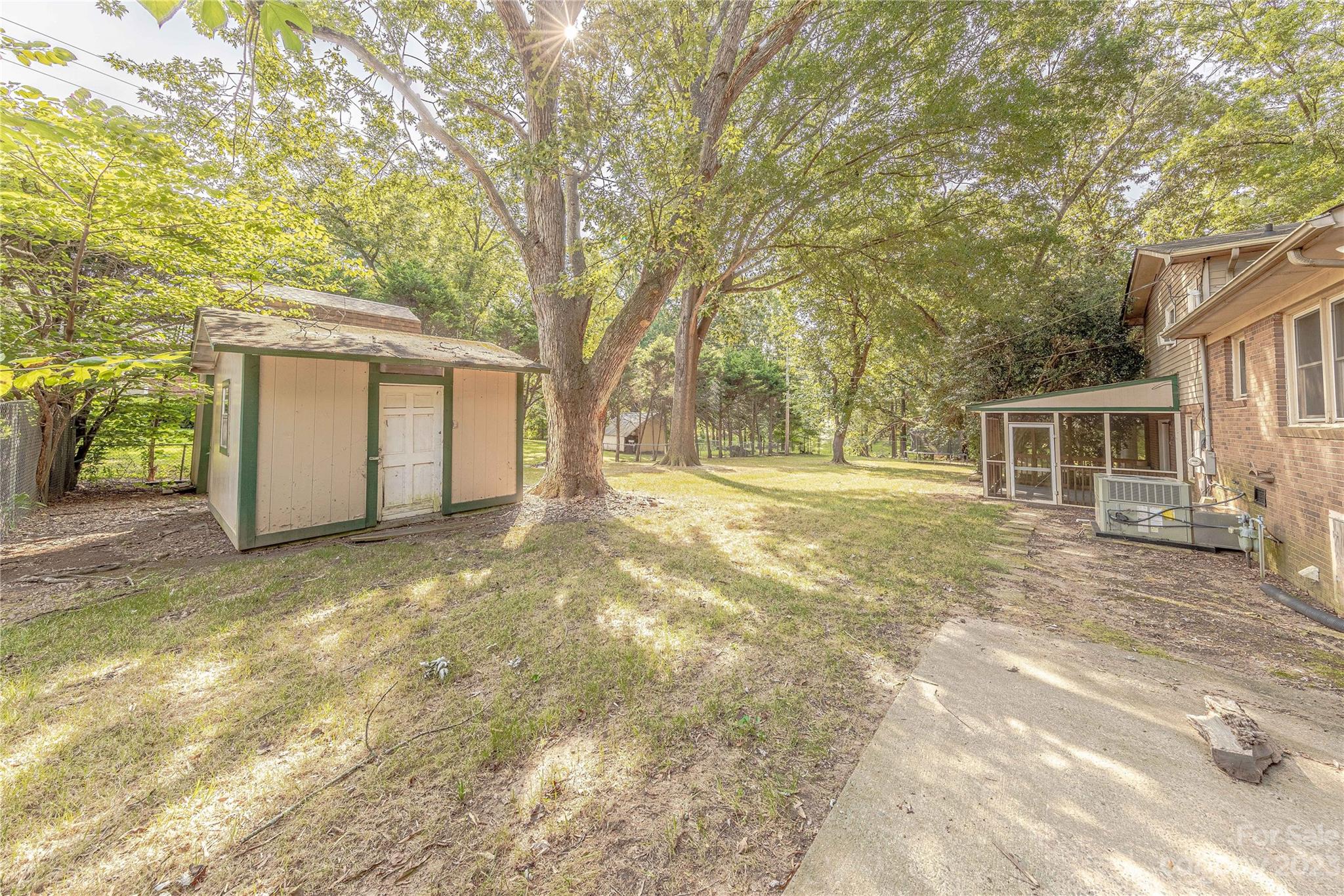 1702 Carson Street Monroe, NC 28110 - Photo 26 of 29 a view of a house with a yard