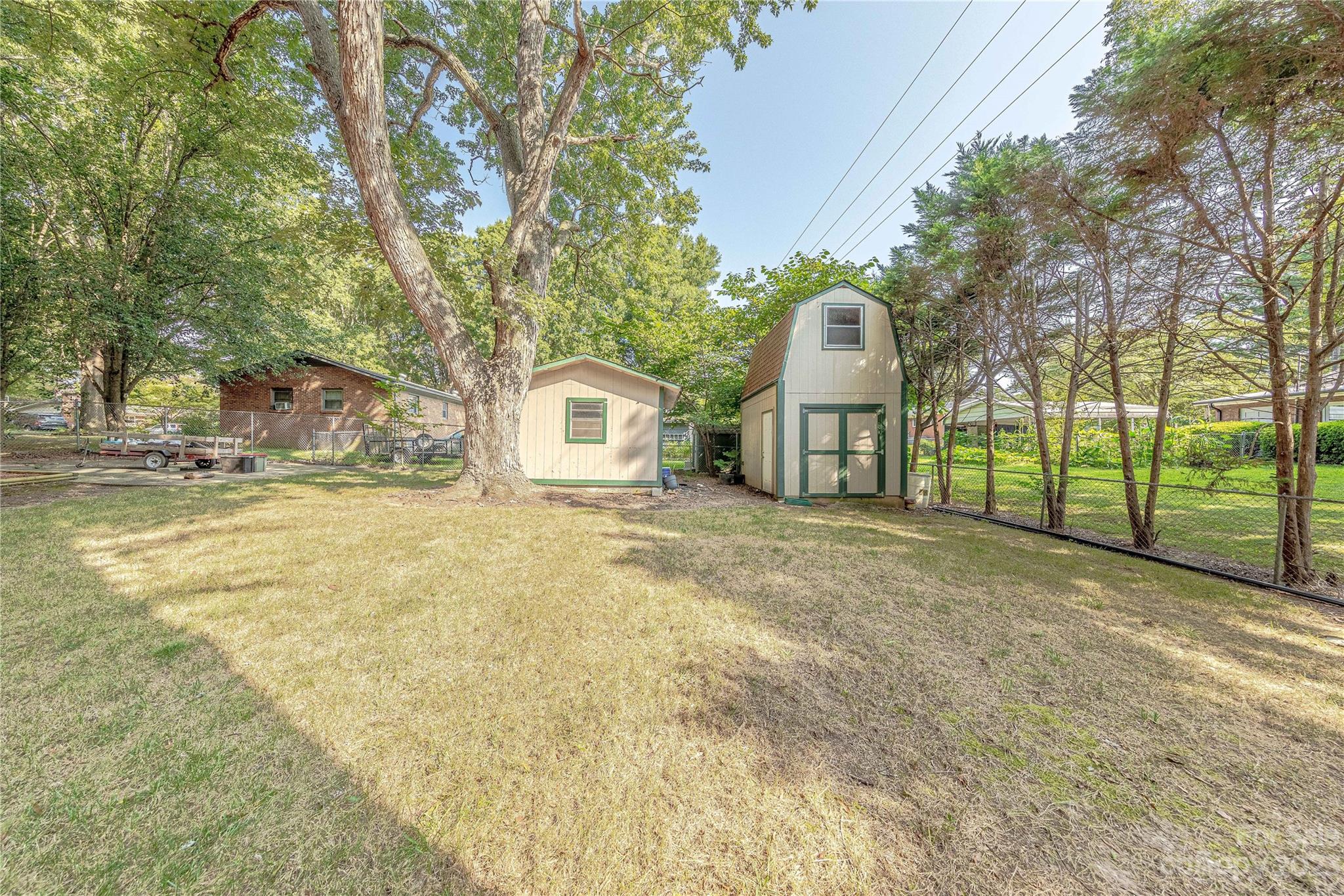 1702 Carson Street Monroe, NC 28110 - Photo 27 of 29 a front view of a house with a yard and garage