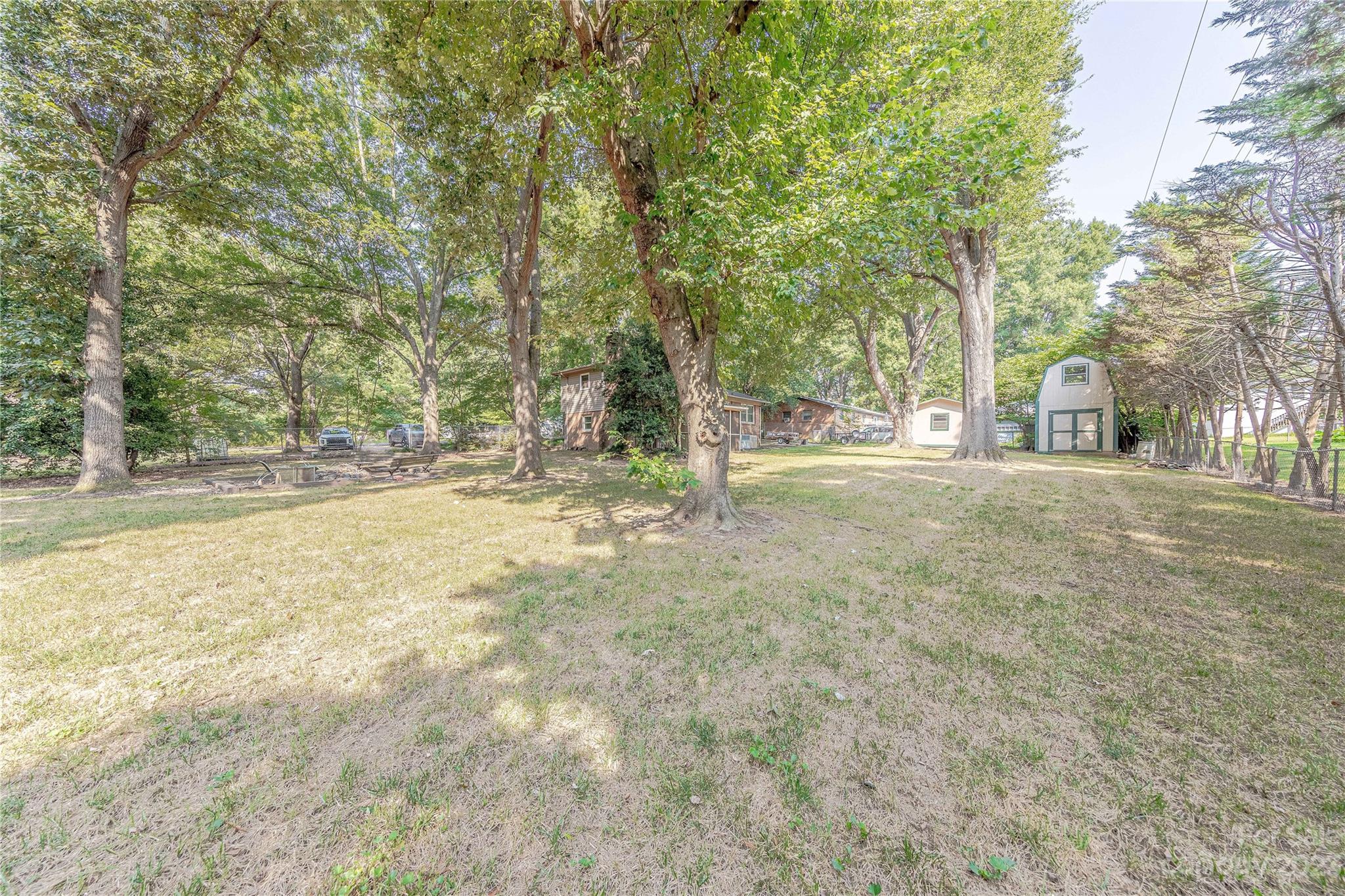 1702 Carson Street Monroe, NC 28110 - Photo 28 of 29 a view of outdoor space with trees
